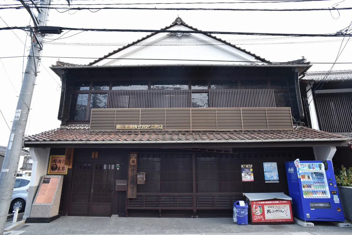 Sake tasting stalls along Sakagura-dori brewery street in Saijo, Japan — 1