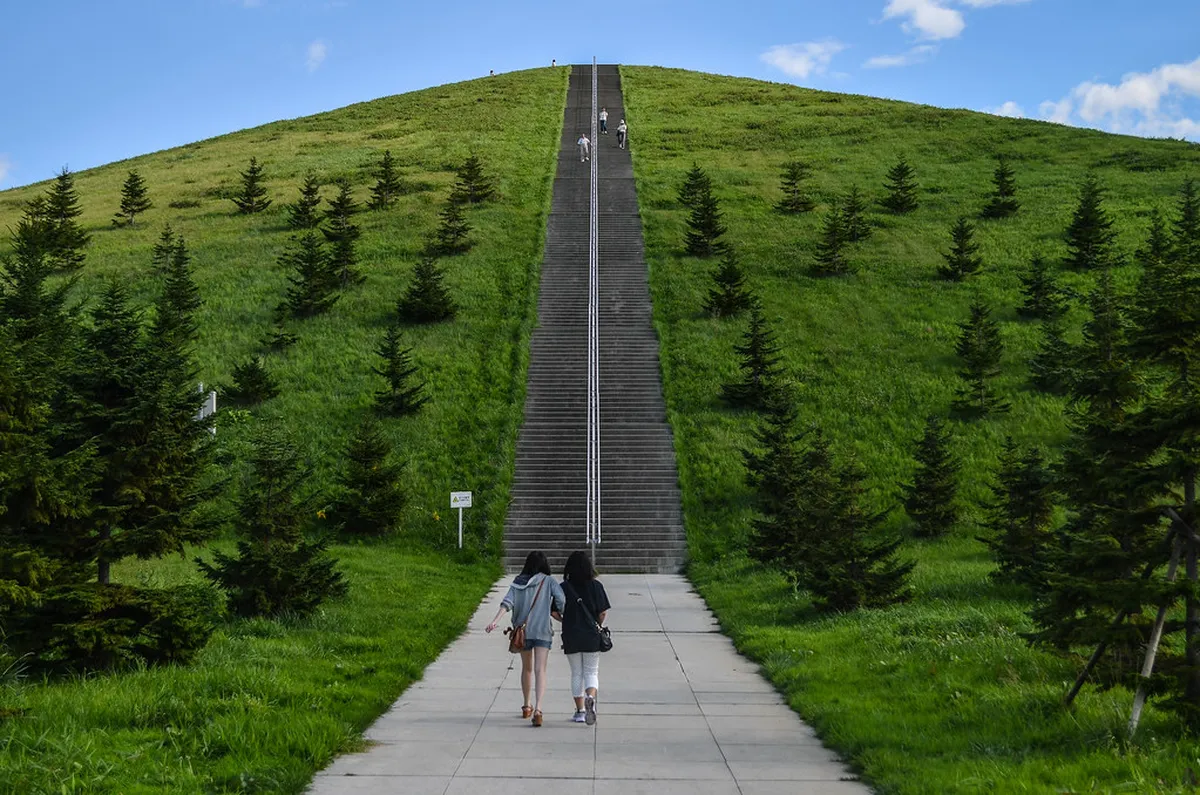 Moerenuma Park in Sapporo showing the iconic Glass Pyramid and geometric landscape design by Isamu Noguchi