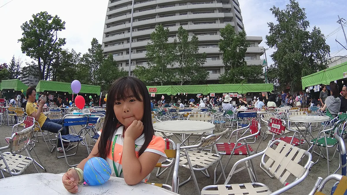 Outdoor beer garden tables in Odori Park during summer, Japan — 1