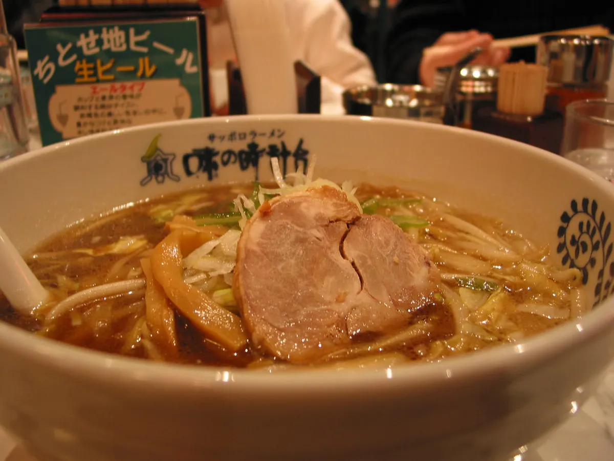 Sapporo miso ramen bowl with rich pork broth topped with butter corn and chashu pork in Ganso Ramen Yokocho Japan