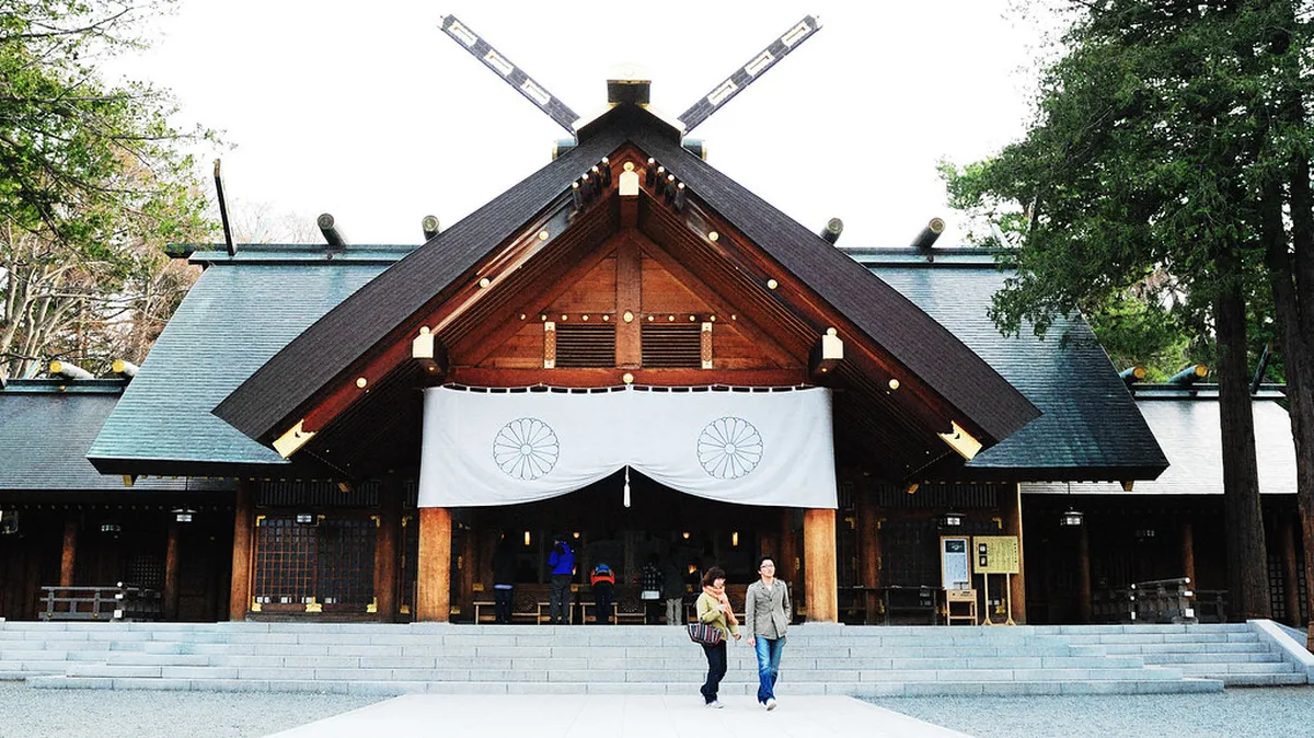 Maruyama Park in Sapporo with forested walking paths leading to the Hokkaido Shrine set among lush green surroundings in Japan