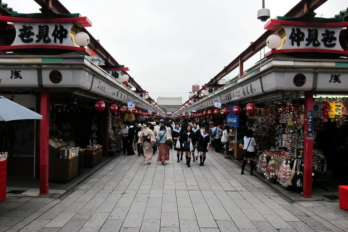 Senso-ji Nakamise-dori shopping street lined with traditional stalls leading to the temple gate in Asakusa, Tokyo, Japan