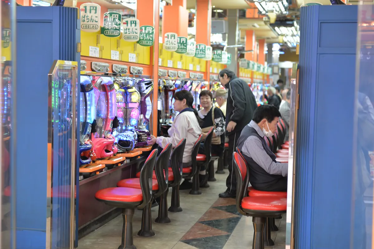 Kushikatsu restaurant in Shinsekai with fried skewers on display and retro Osaka street atmosphere, Japan