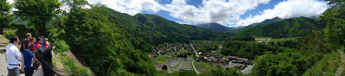 Panoramic view of Shirakawa-go from Shiroyama viewpoint showing gassho farmhouses in the valley