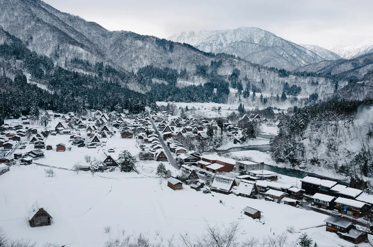 Shirakawa-go village blanketed in snow during winter with traditional gassho-zukuri roofs