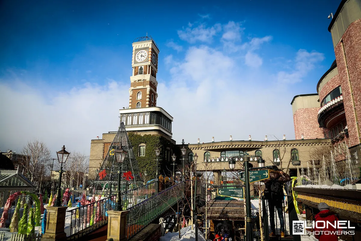 Shiroi Koibito Park clock tower in the Tudor-style courtyard of Sapporo's famous chocolate theme park in Hokkaido Japan