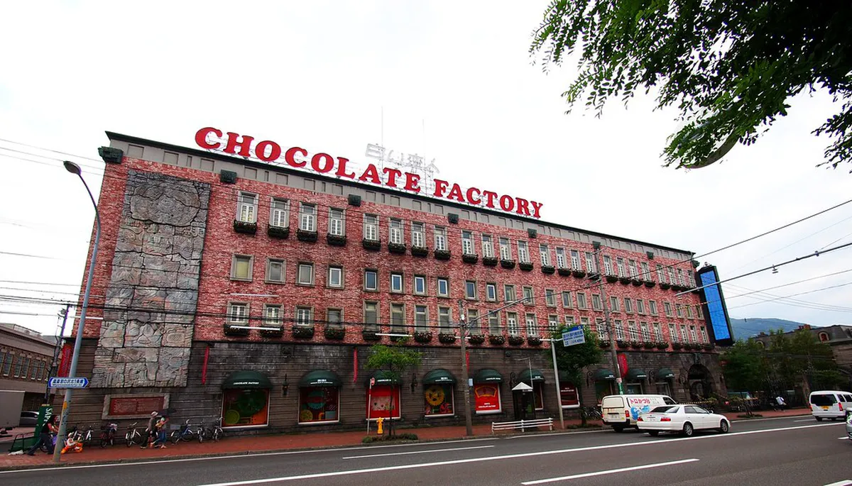 Shiroi Koibito chocolate factory production line viewed through observation windows at Sapporo's iconic confectionery park