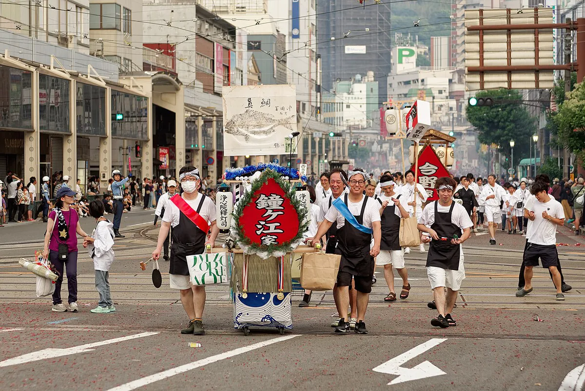 Spirit boat carried through Nagasaki streets during Shoro Nagashi, Japan — 1