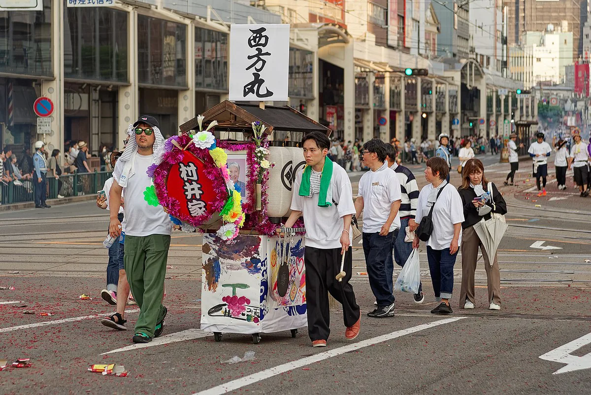 Spirit boat carried through Nagasaki streets during Shoro Nagashi, Japan — 2