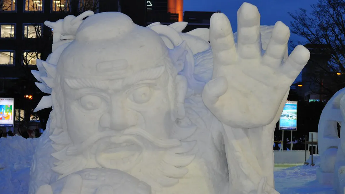 Illuminated clear ice sculptures lining the Susukino entertainment district during the Sapporo Snow Festival in Japan