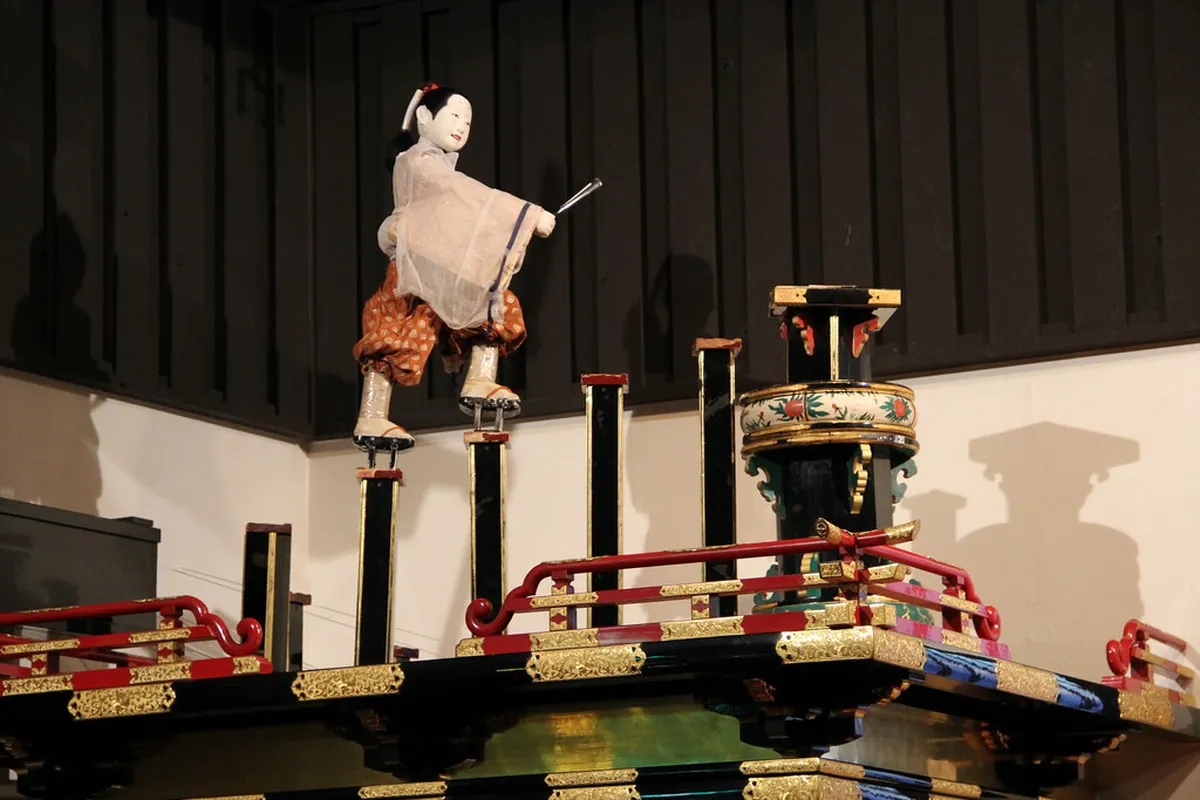 Traditional karakuri mechanical puppet performance at the Takayama Autumn Festival in Gifu, Japan