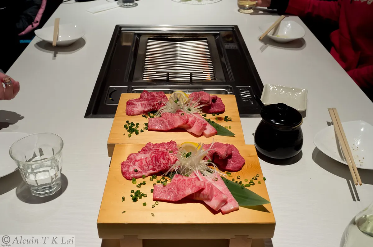 Marbled Hida beef wagyu cuts on a wooden board at a Takayama restaurant in Gifu, Japan