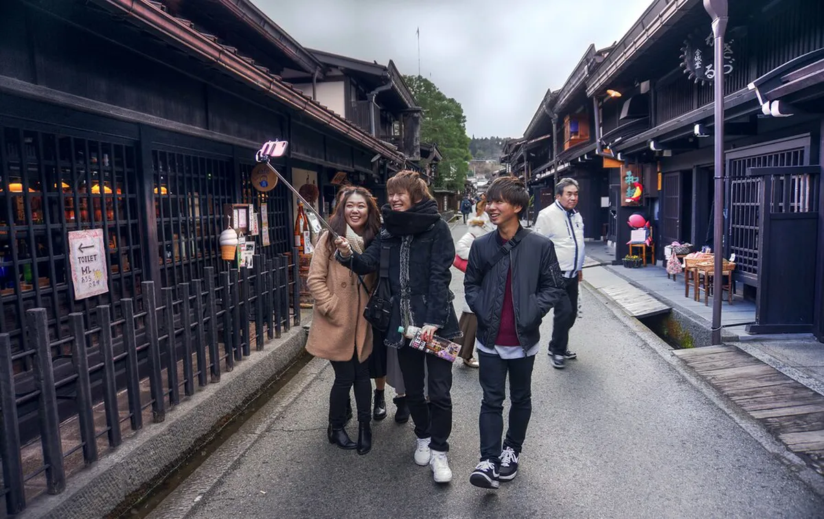 Preserved Edo-period wooden merchant houses lining the quiet streets of Takayama Old Town in Japan