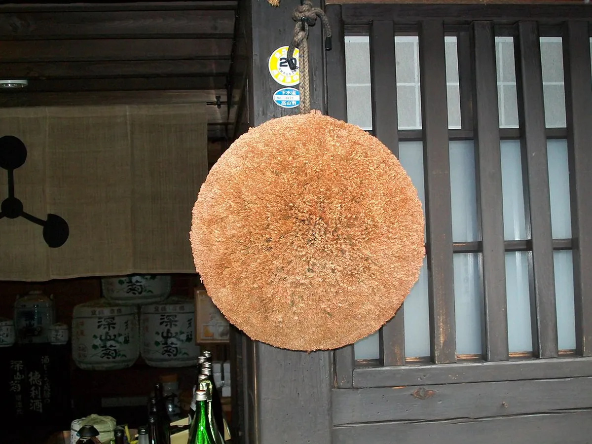 Cozy interior of a sake bar in Takayama’s historic Old Town district during evening, Japan