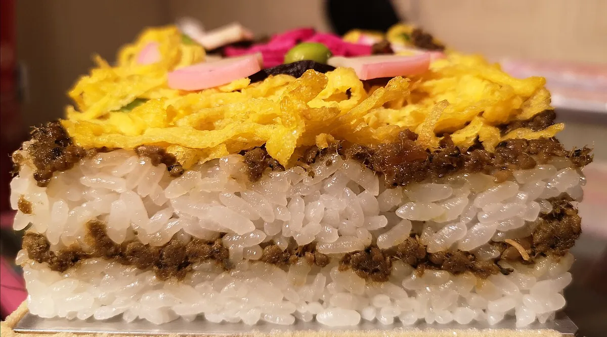 Colorful Tango barazushi layered with mackerel, egg and vegetables, Japan — 1