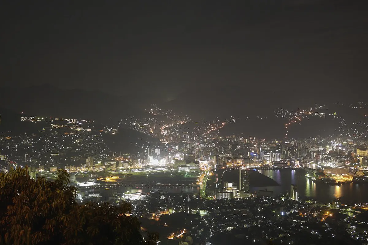 Panoramic night view of Nagasaki city lights and harbour from the summit of Mount Inasa, one of Japan's three great night views