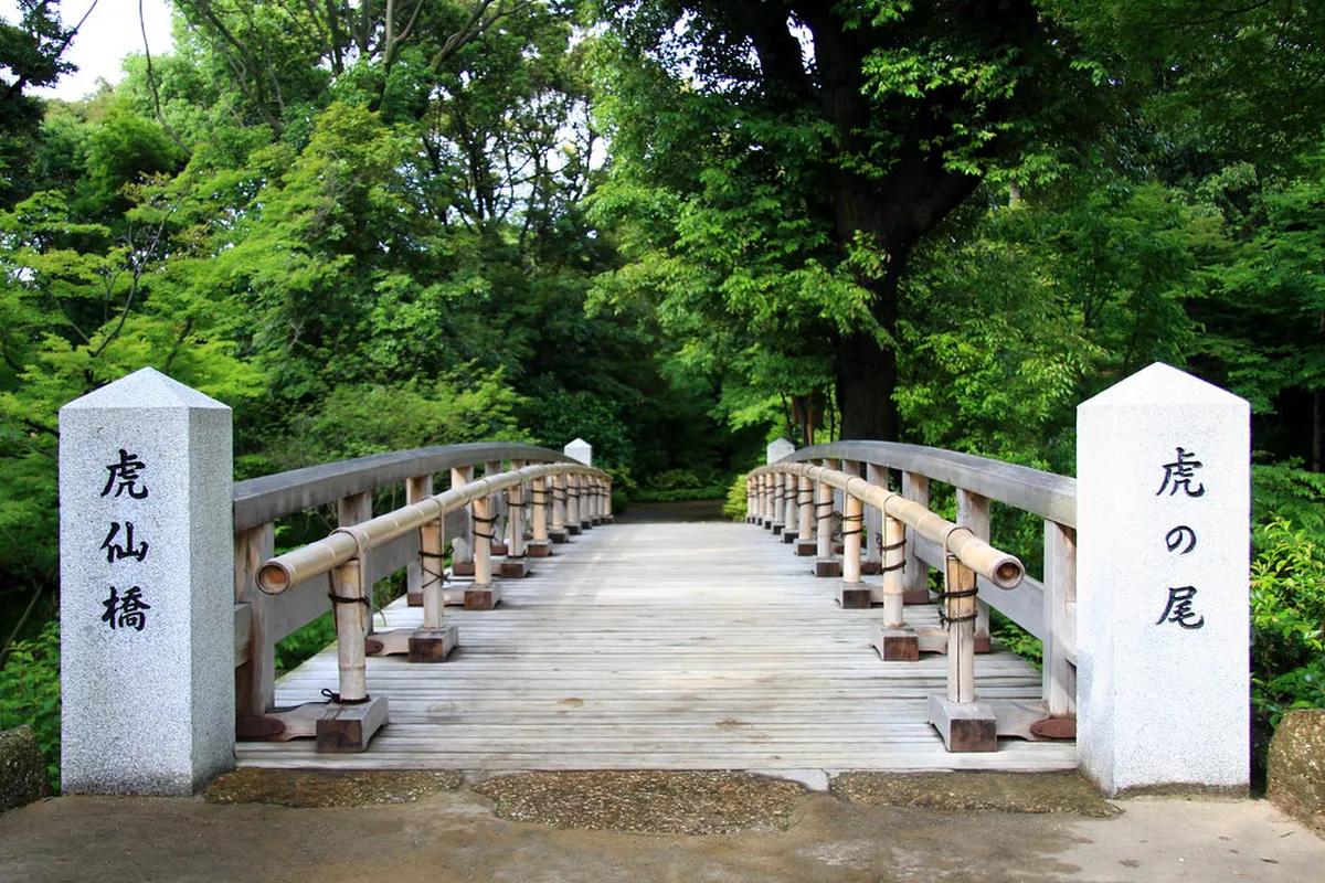 Tokugawa Art Museum entrance with traditional stone walls and the historic Kuro-mon Black Gate in Nagoya, Japan