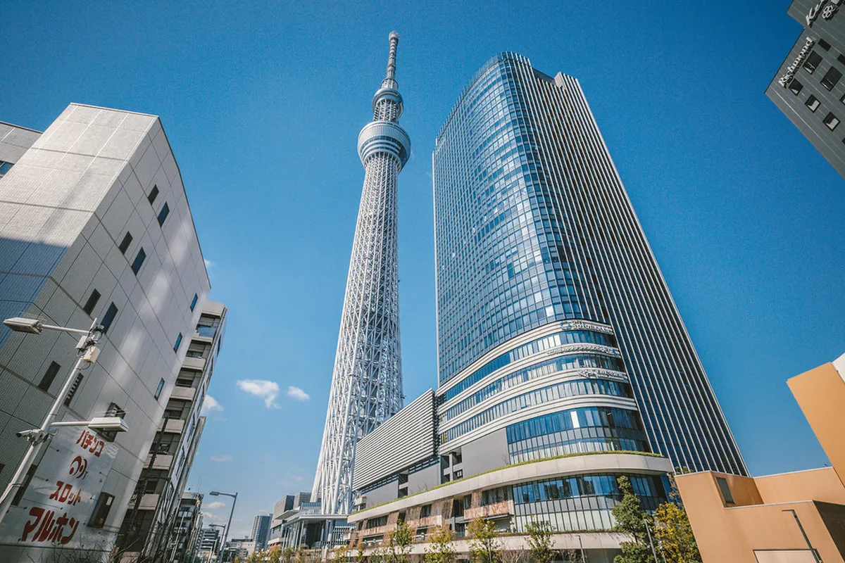 The Tokyo Skytree tower illuminated at dusk above the Sumida ward, one of Tokyo’s most recognisable landmarks in Japan