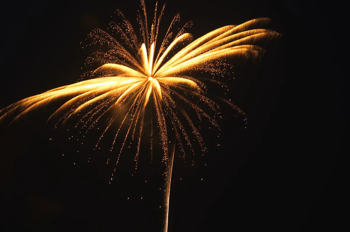 Brilliant fireworks bursting over the Sumida River at night during Tokyo’s historic summer fireworks festival in Japan