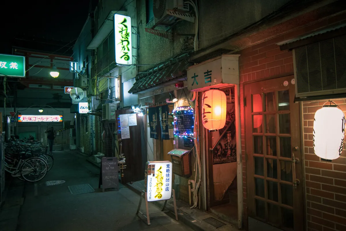 Neon-lit lanes of Golden Gai in Tokyo's Shinjuku district glowing at night, Japan