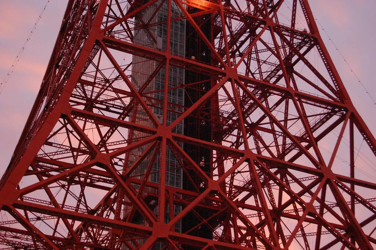Tokyo Tower orange-lattice structure viewed from Shiba Park showing its Eiffel Tower-inspired design in Japan