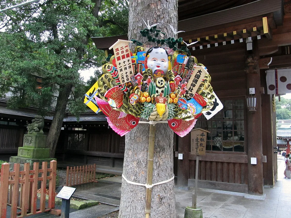 Vendors selling kumade lucky rakes at a Tori no Ichi fair, Japan — 1