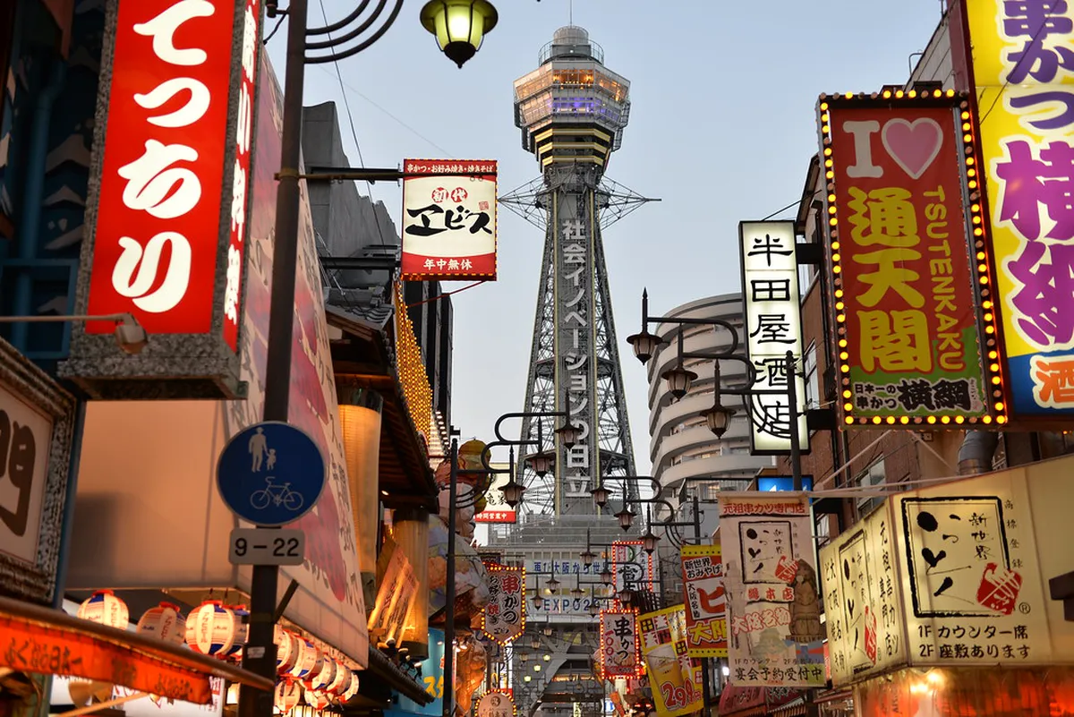Tsutenkaku Tower observation deck with panoramic views over the Shinsekai district of Osaka, Japan