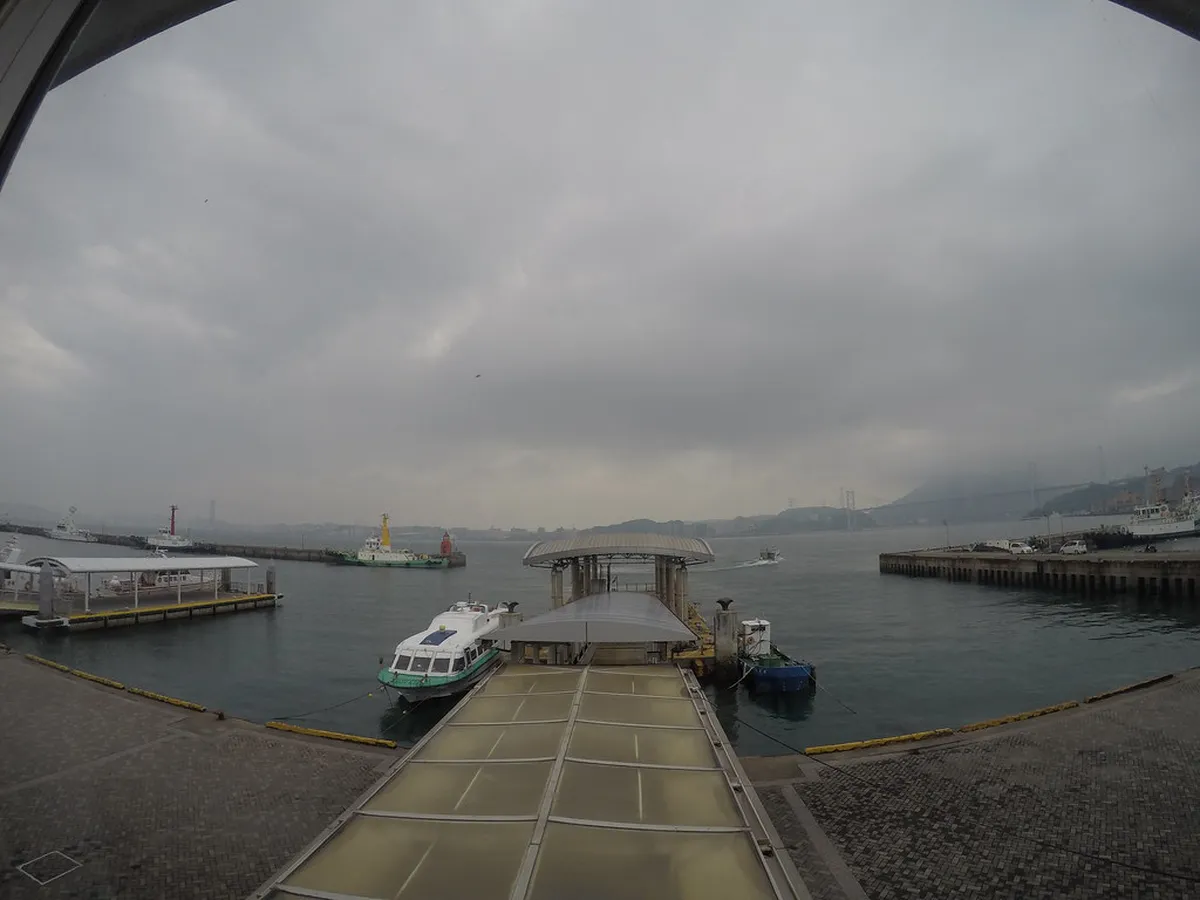 Hakata Bay shoreline and green park grounds near Fukuoka's Uminonakamichi coastal peninsula, Japan