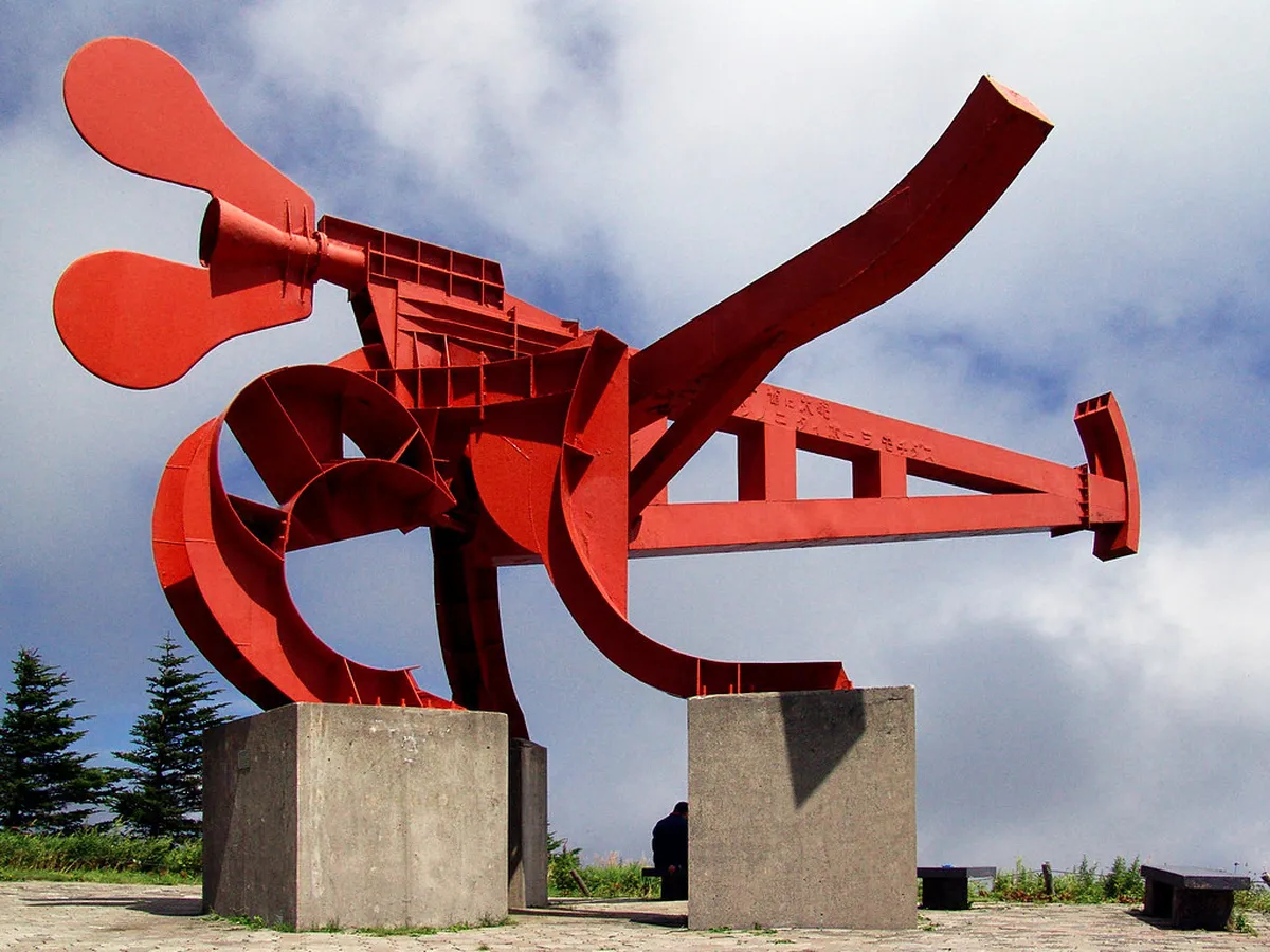 Large-format sculpture in the Utsukushigahara Open-Air Museum against the alpine meadow of Matsumoto, Nagano