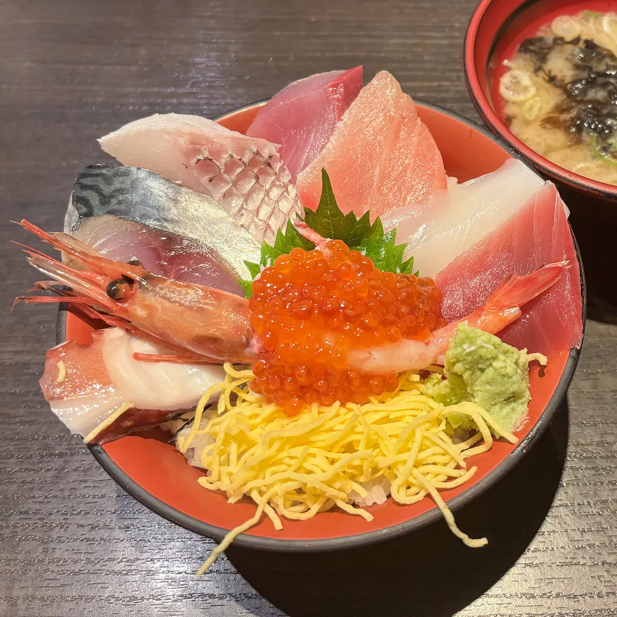Kaisendon rice bowl topped with fresh sashimi and seafood from Omicho Market Kanazawa