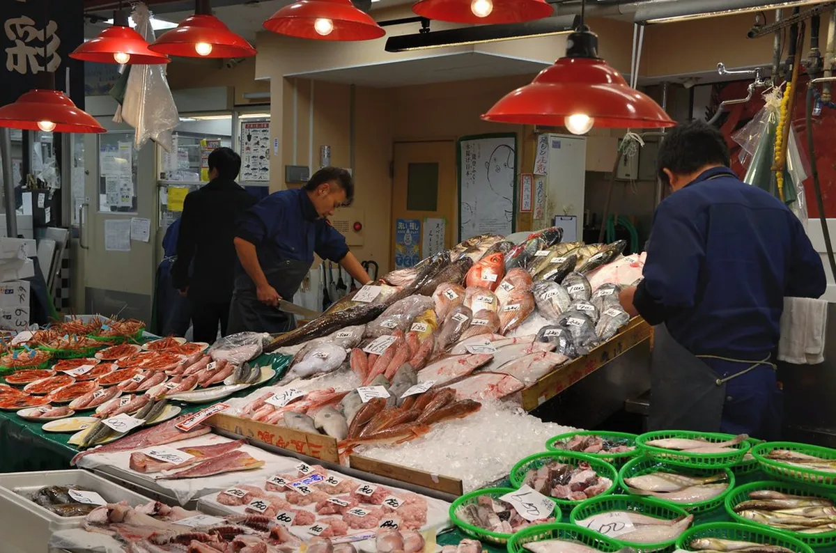 Fresh seafood stalls packed with crabs and fish at Omicho Market in Kanazawa