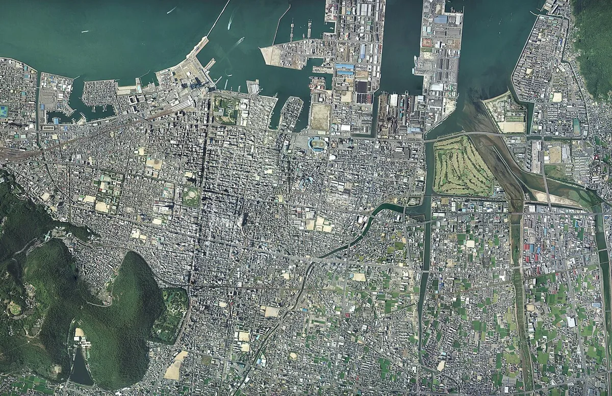 Takamatsu city and port seen from above at dusk — 2
