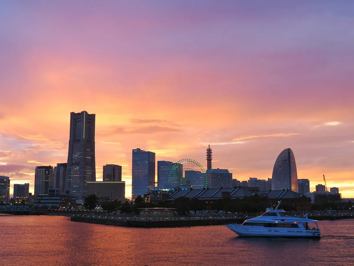 Osanbashi International Passenger Terminal wooden rooftop deck at sunset overlooking Yokohama harbor, Japan