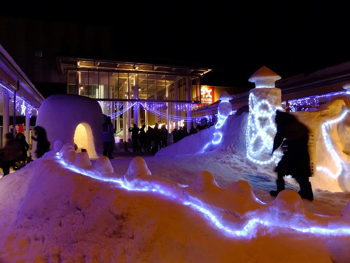 Snow kamakura huts lit at night during the Yokote Kamakura Festival, Japan — 1