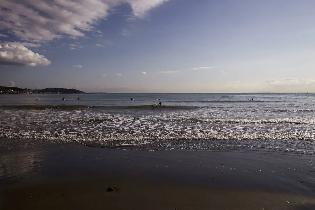 Coastal promenade walk along the Kamakura shoreline with views of Sagami Bay and the Pacific in Japan