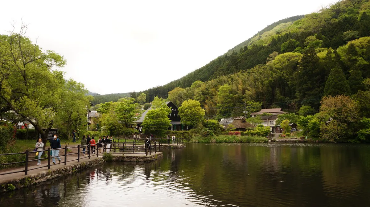 Oita River walking path with unobstructed views of Mount Yufu volcano framing the Yufuin valley in Japan